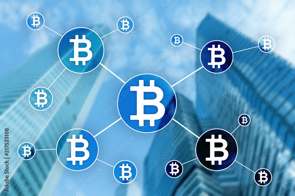 Bitcoin cryptocurrency and blockchain technology concept on blurred skyscrapers background. Bitcoin cryptocurrency and blockchain technology concept on blurred skyscrapers background.