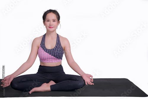 young woman practicing yoga To strengthen the shape of meditation strength in the whtie background