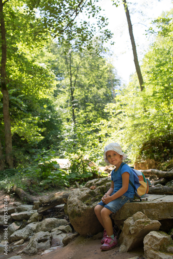 Girl child in the forest Girl child in the forest