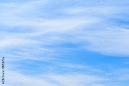White clouds in azure sky as background