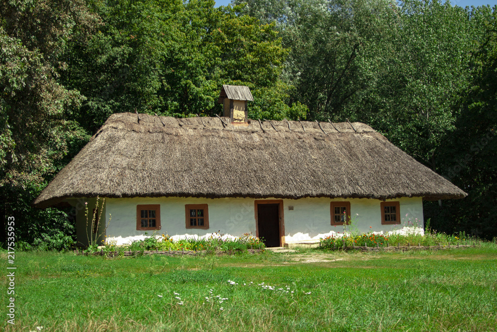 Ukrainian ancient typical house with thatched roof 