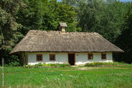 Ukrainian ancient typical house with thatched roof 