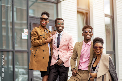 awesome joyful african lawyers in dashy outfits photo