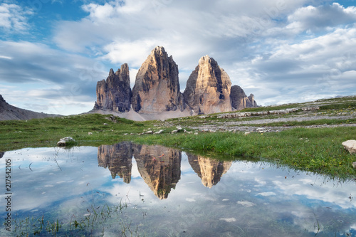 Mountains reflection on the water surface. Natural landscape in the Dolomites Alps in the Italy. Tre Cime di Lavaredo mountains