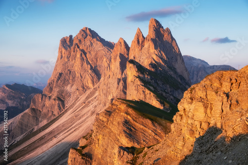 High mountains in the Dolomite alps, Italy. Beautiful natural landscape at the summer time. Mountains and sky during sunset.