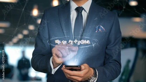 Businessman With Mobile Phone Opens Hologram HUD Interface and Touches Word - USER PERSONA