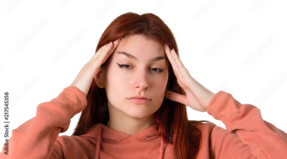 Young redhead girl with pink sweatshirt unhappy and frustrated with something. Negative facial expression on isolated white background Young redhead girl with pink sweatshirt unhappy and frustrated with something. Negative facial expression on isolated white background