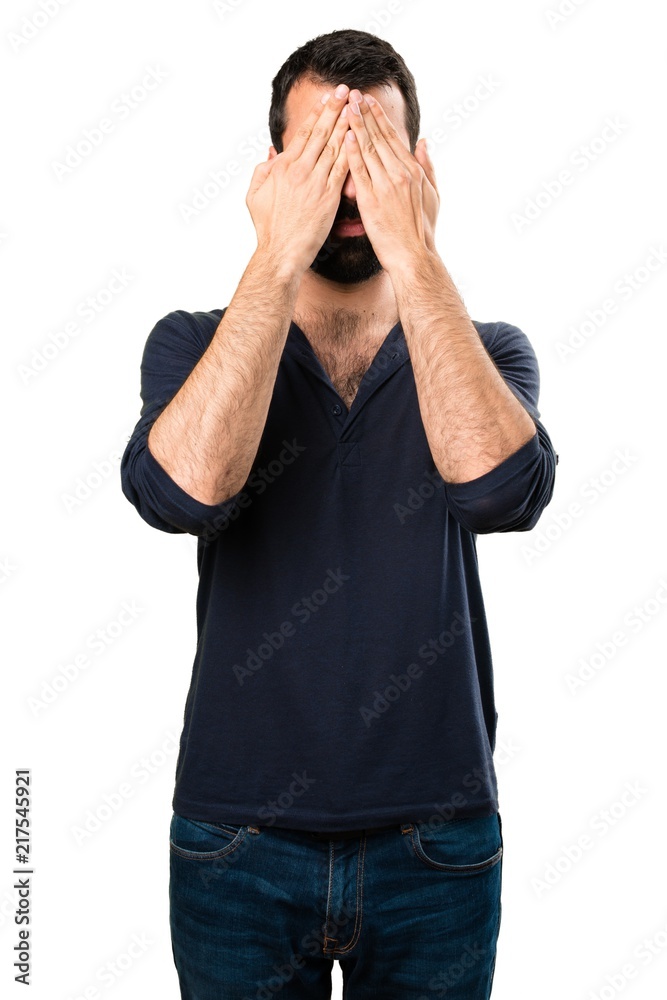 Handsome man with beard covering his eyes Handsome man with beard covering his eyes
