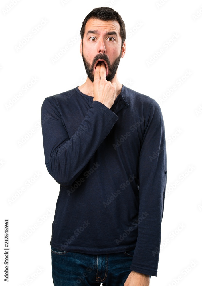 Handsome man with beard making vomiting gesture Handsome man with beard making vomiting gesture