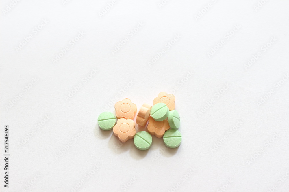 pills isolated on white paper background with copy space for text pills isolated on white paper background with copy space for text