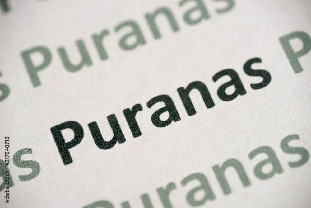 word Puranas printed on paper macro word Puranas printed on paper macro