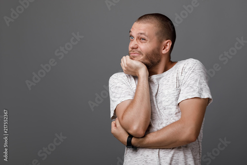 the portrait of the young bearded man photo