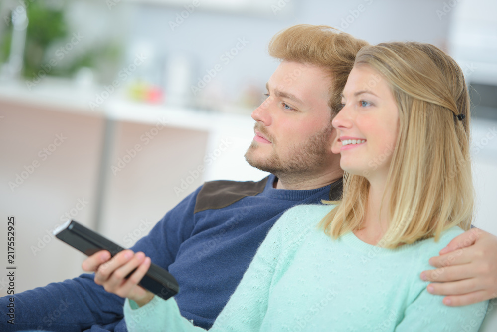 Couple watching a TV series Couple watching a TV series