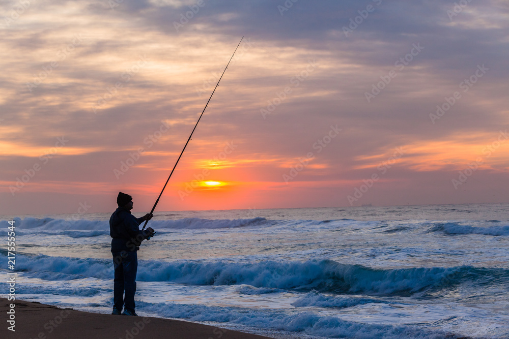 Fishing Silhouetted Beach Ocean Sunrise