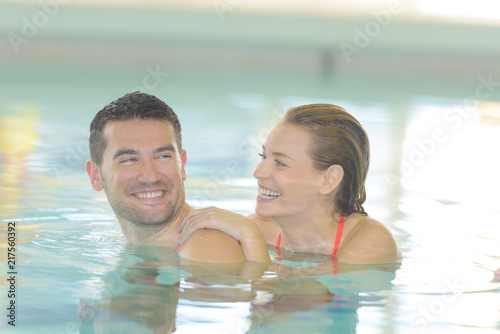 couple swimming pool relationship concept