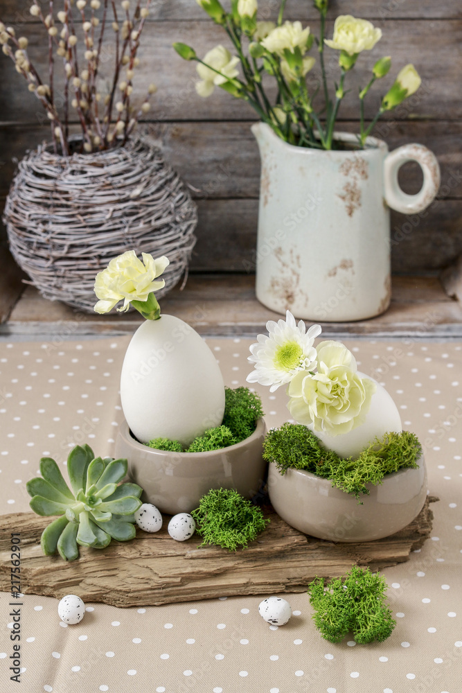 Floral arrangement with goose egg, carnations, chrysanthemum and moss. Floral arrangement with goose egg, carnations, chrysanthemum and moss.