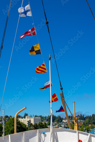 maritime flags flying on an ocean vessel