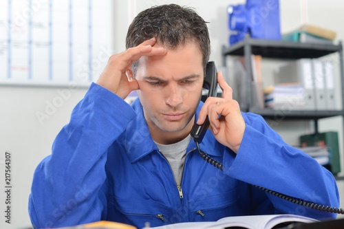 Electrician with equipment on his desk photo