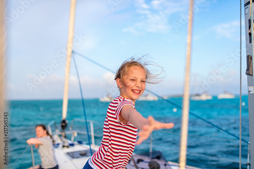 Little girl at luxury yacht
