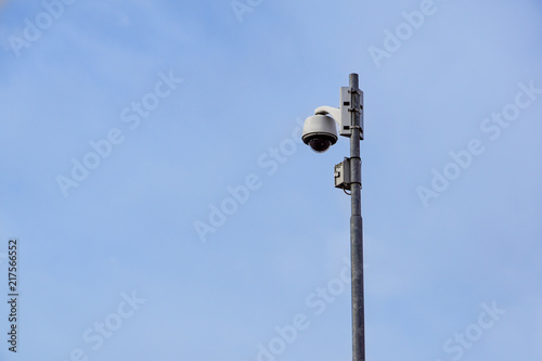 outdoor video surveillance camera , dome security camera on the street.