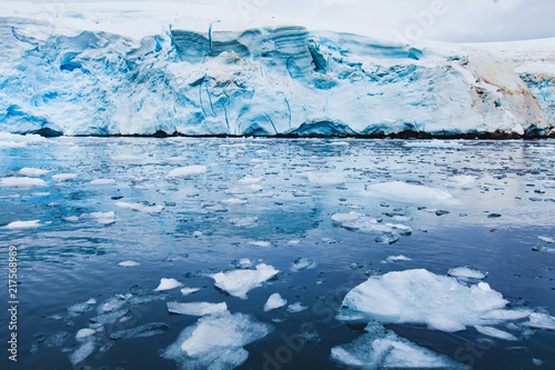 iceberg melting in Antarctica  beautiful nature landscape with glacier and ice in water  global warming