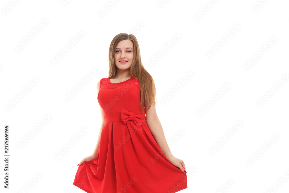 beautiful blonde in a red dress on a white background