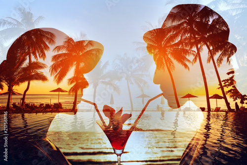 Canvas Print party time double exposure, silhouette of happy couple drinking cocktail togethe