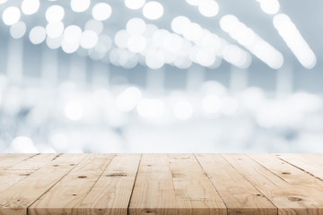 Empty wooden table and abstract blurred image background display montage for product.