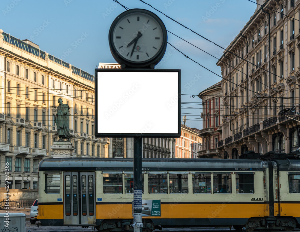 Fototapeta premium blank billboard clock time mock up in milano city center