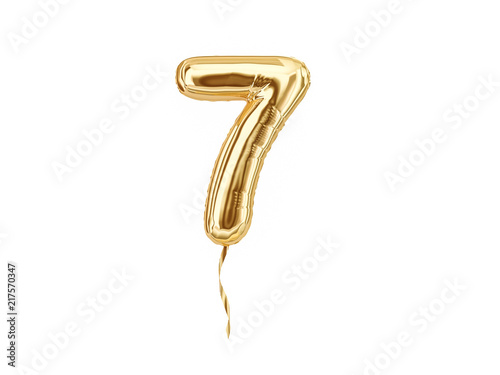 Numeral 7. Foil balloon number seven isolated on white background photo