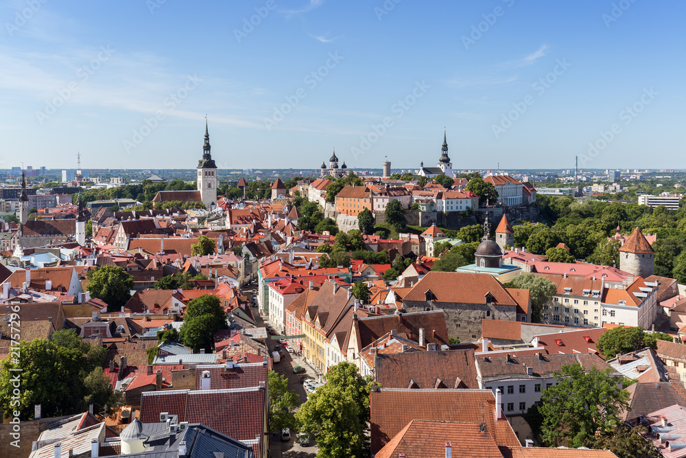 St. Nicholas' Church, St. Alexander Nevsky Cathedral, St. Mary's Cathedral and other old buildings at the Old Town in Tallinn, Estonia, viewed from above on a sunny day in the summer.