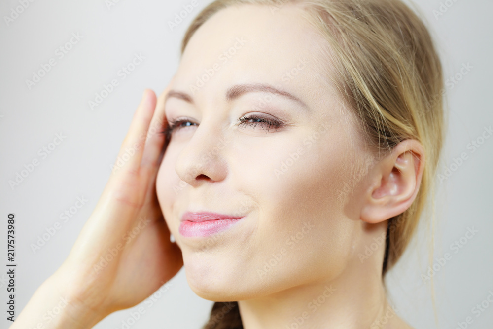 Young woman feeling headache