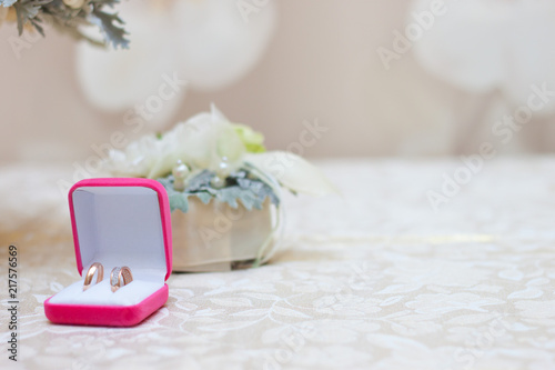 Wedding rings and unusual beautiful wedding bouquet
