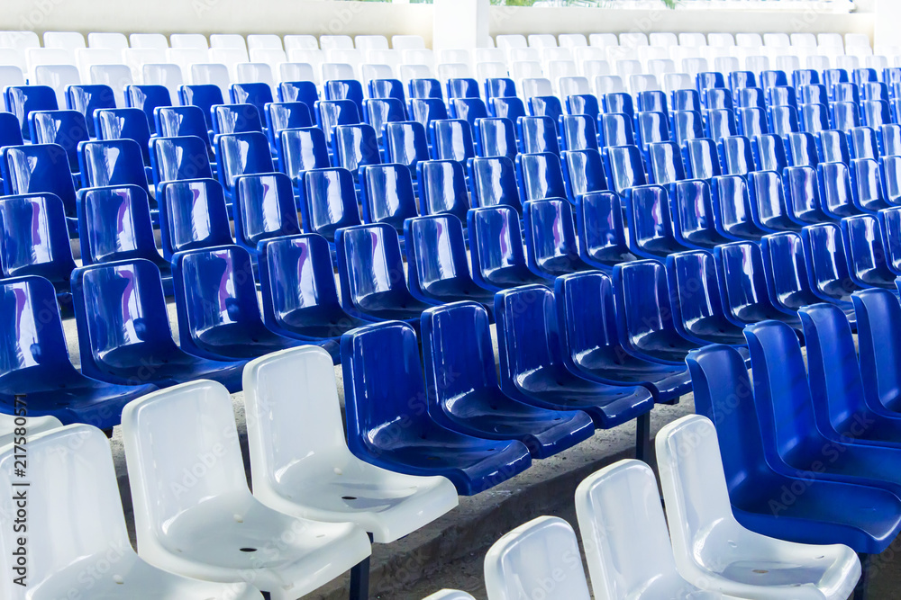 Fototapeta premium Row of chairs in blue and white