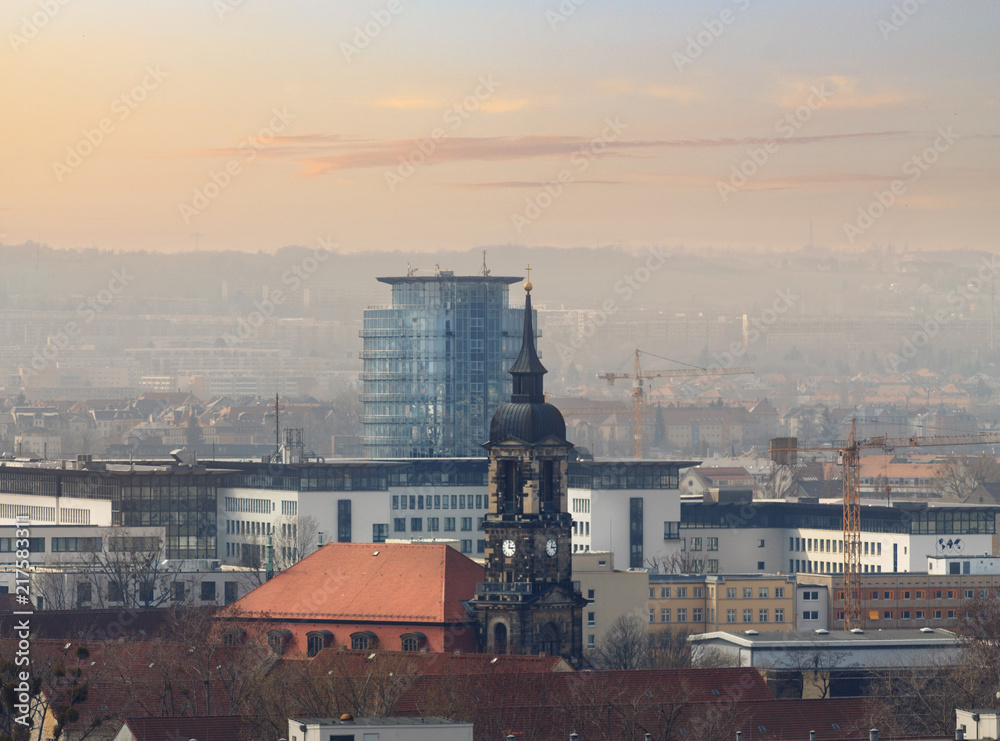high-rise buildings of Dresden during sunset.