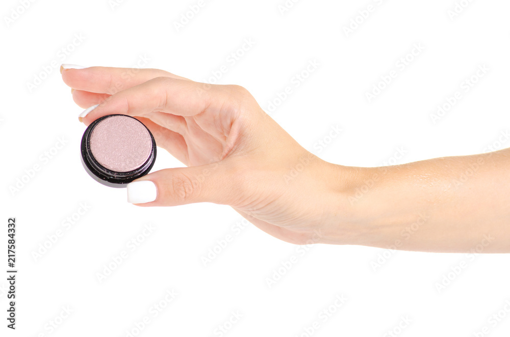 Shadows for the eyelids in hand on white background isolation Shadows for the eyelids in hand on white background isolation