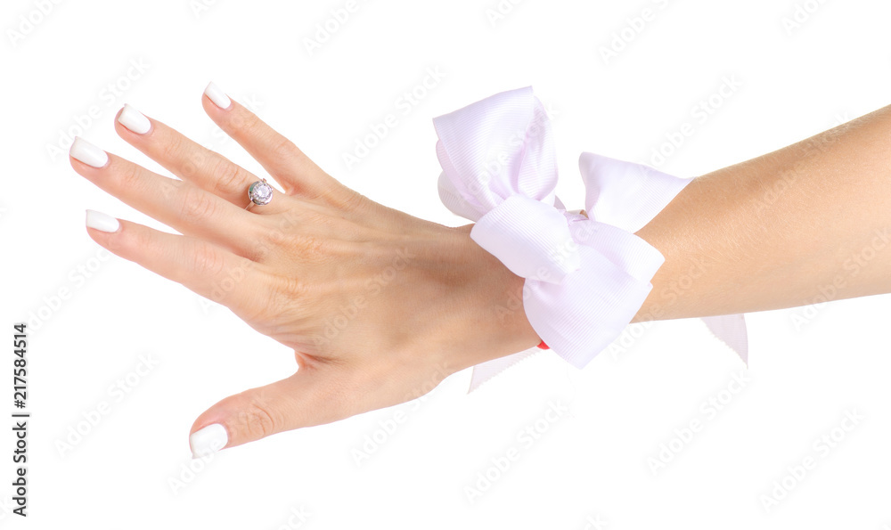 White bow on hand bride on white background isolation White bow on hand bride on white background isolation
