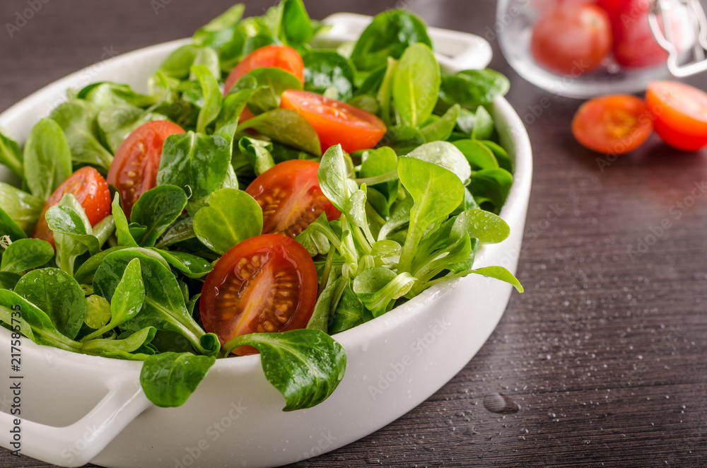 Lamb lettuce salad, tomatoes and herbs Lamb lettuce salad, tomatoes and herbs