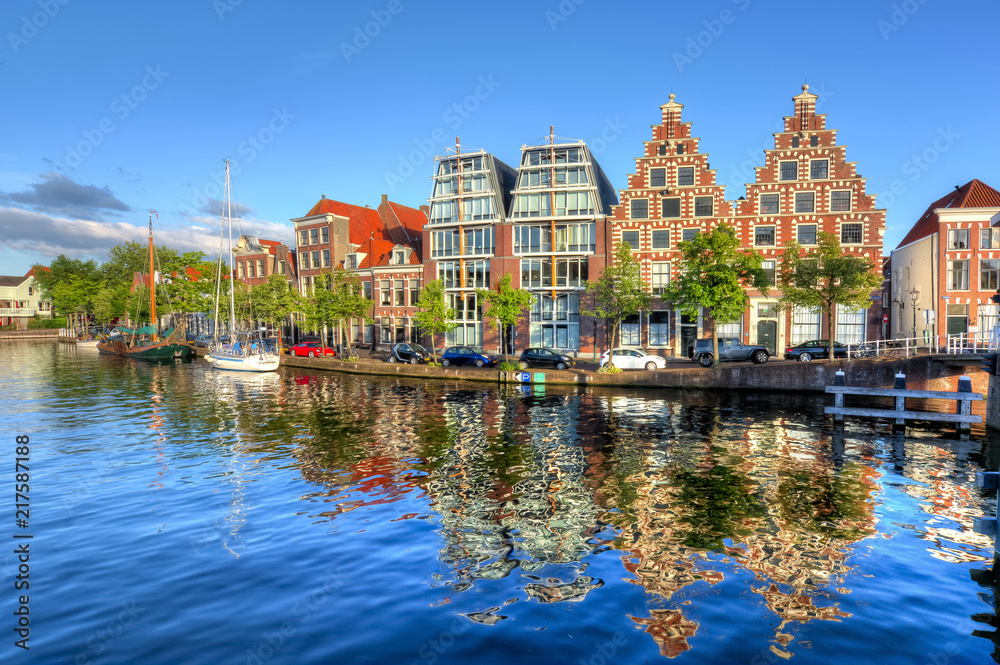 Houses reflection in Haarlem canals, Netherlands