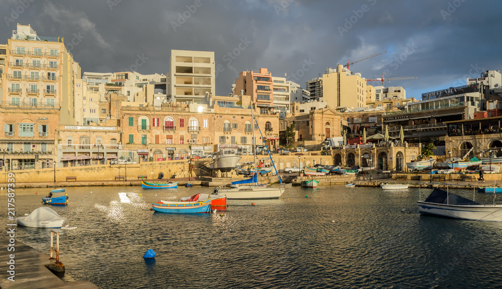 Spinola bay, Malta, St. Julian, boats after the rain