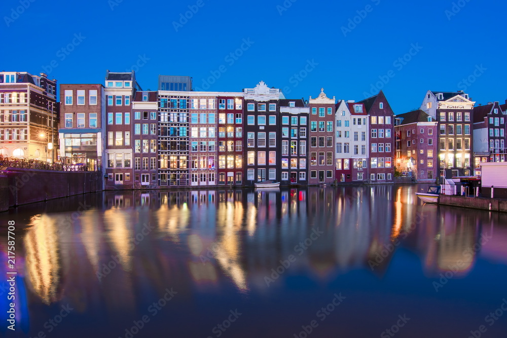 Damrak canal at night, Amsterdam, Netherlands