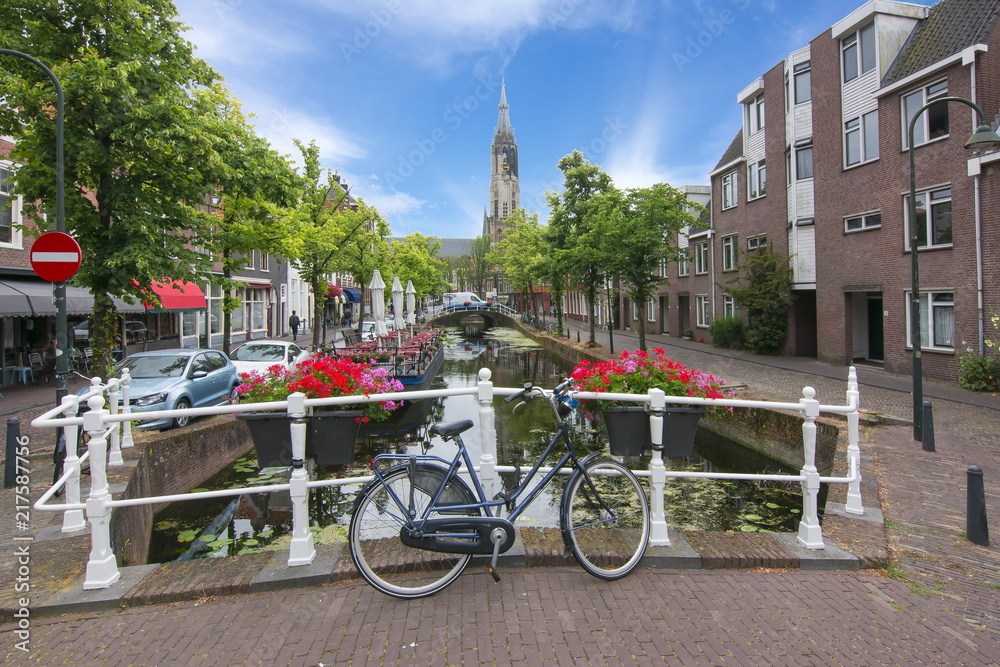 Delft canals and New church tower, Netherlands