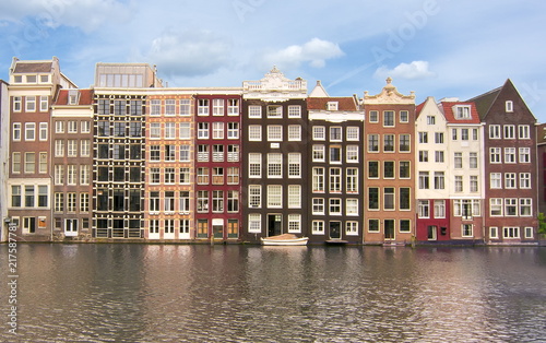 Amsterdam architecture and Damrak canal, Netherlands