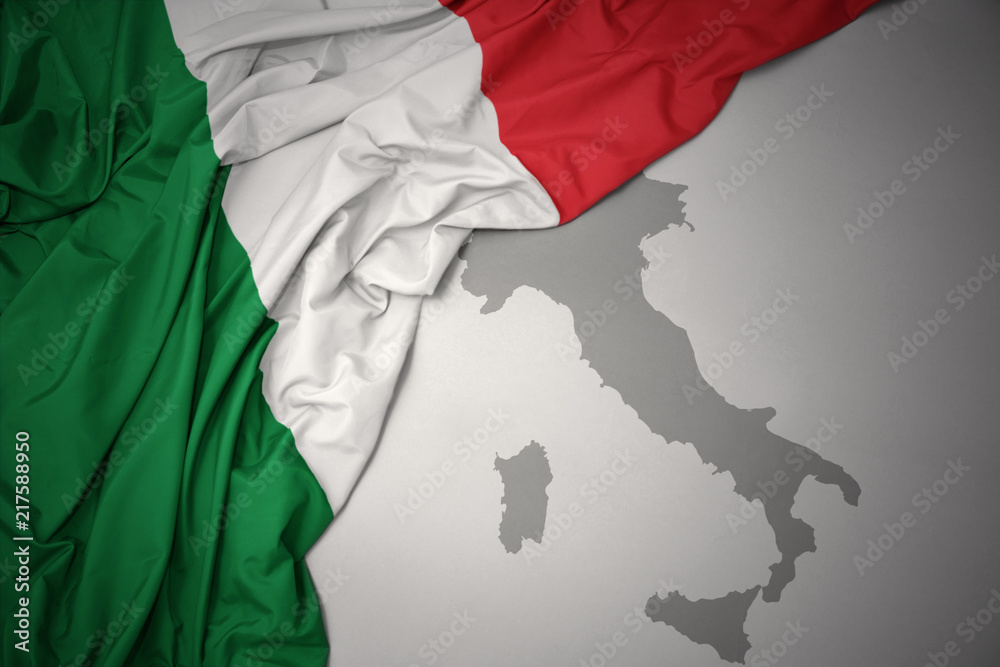 Obraz premium waving colorful national flag and map of italy .