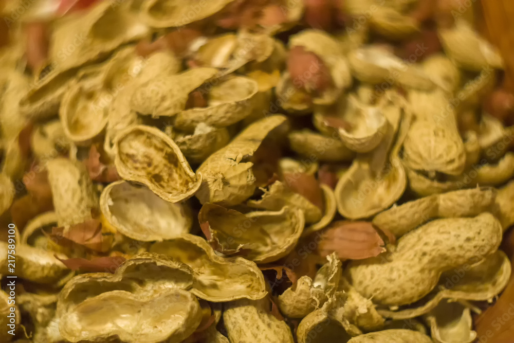 Fototapeta premium Peanuts with shells close up photo.