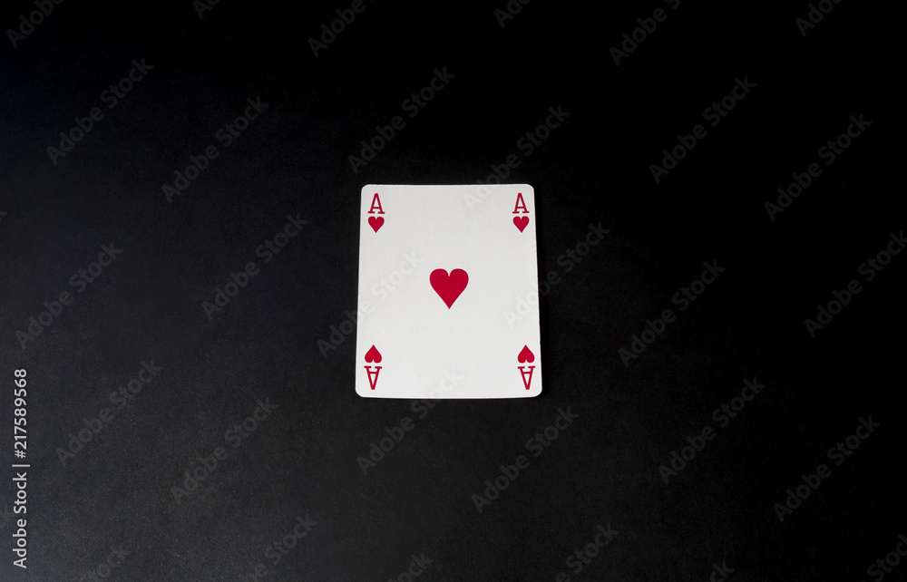 Poker, blackjack card. Ace isolated on black desk. Top view, flat lay.