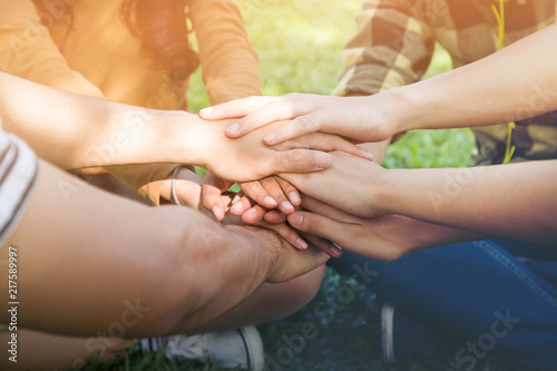 Group with hands together