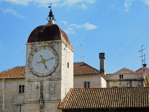 A nice photo of the clock tower in Trogir, the roofs of the old town, Croatia