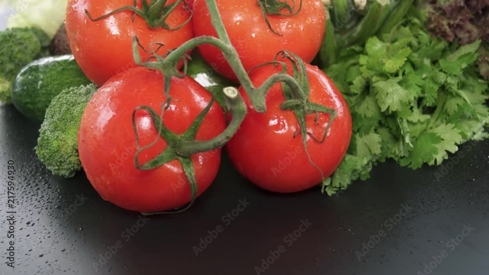 Assortment of Fresh Raw Vegetables Including Tomatoes, Cucumber, Cauliflower, Salad Leaves, Coriander, Broccoli, Bell Pepper Assortment of Fresh Raw Vegetables Including Tomatoes, Cucumber, Cauliflower, Salad Leaves, Coriander, Broccoli, Bell Pepper