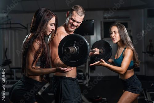 group with dumbbell weight training equipment on sport gym.